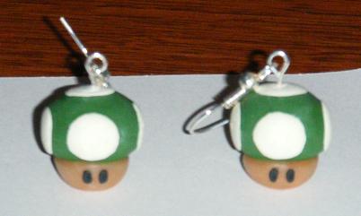 The first earrings that I made. These were about the size of a dime. Unfortunately I didn't have the clay I wanted for the faces at the time.