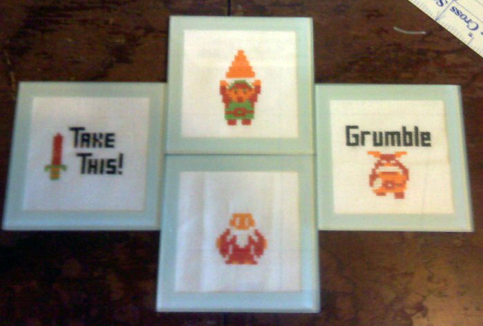 Four coasters featuring sprites from the original Legend of Zelda.