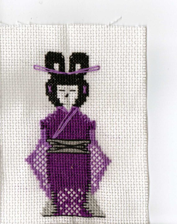 This is the second one. You can see a little bit more detail in this one. This one I call The Plum Blossom Maiden.