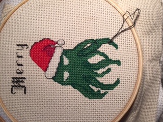 This is sideways, but this is for one of my mods over on twitch (who lives in Sweden). It'll say "Merry Cthulhumas" when it's finished, and the eyes are a yellow glow in the dark. :3