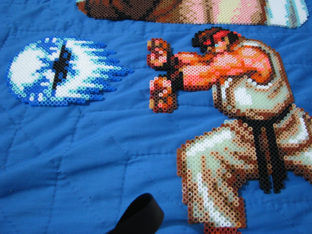 Ryu's fireball pose with fireball from the Sega Genesis version.