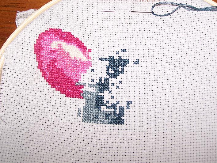 And heres a close up. I started from the upper left and going till I hit the lower Right. Just like when you do paint by numbers and crochet stuff. But yeah, one ear and much of the light shadowed fur around it. The eye goes between the random looking Dark blues XD. But there is a mannor to the madness. One color at a time 8D.